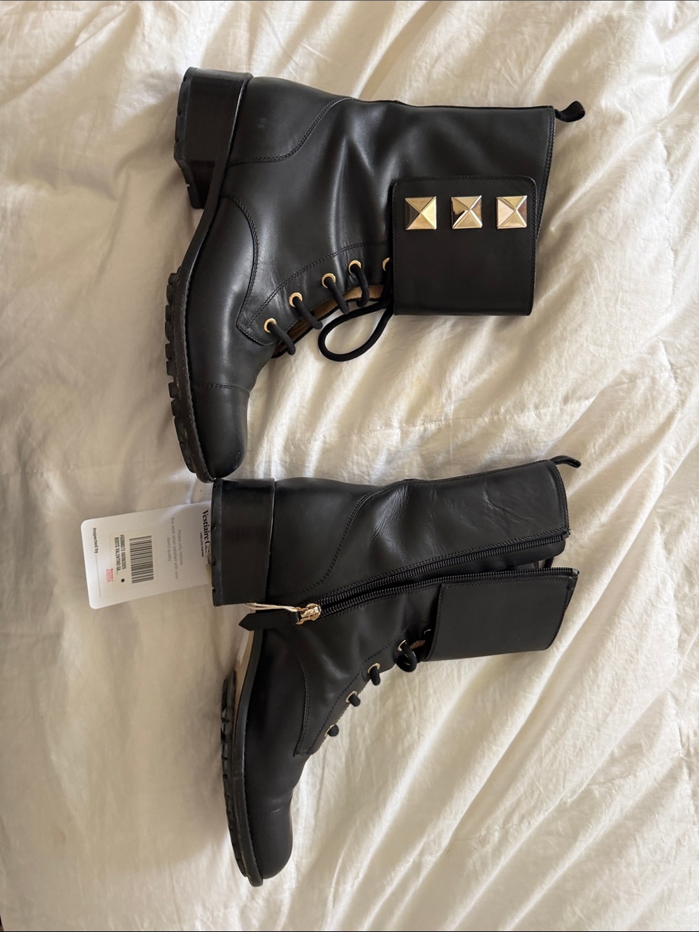 Valentino Garavani Black Leather Combat Boots with Gold Pyramid Studs